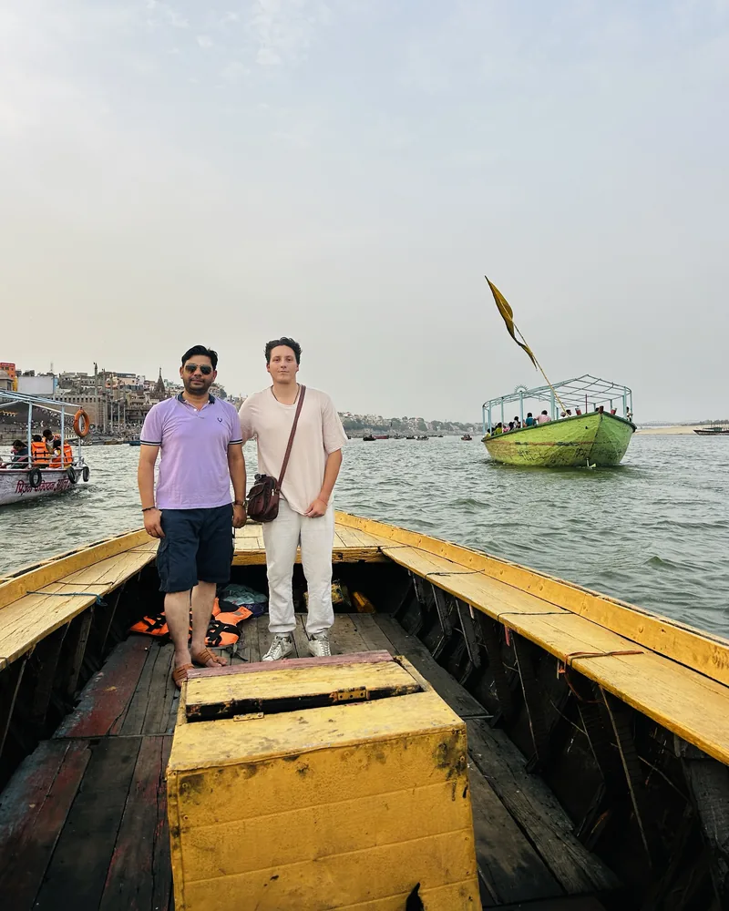 Amit Kumar Jha with Claudio on a boat on the Ganges, Varanasi